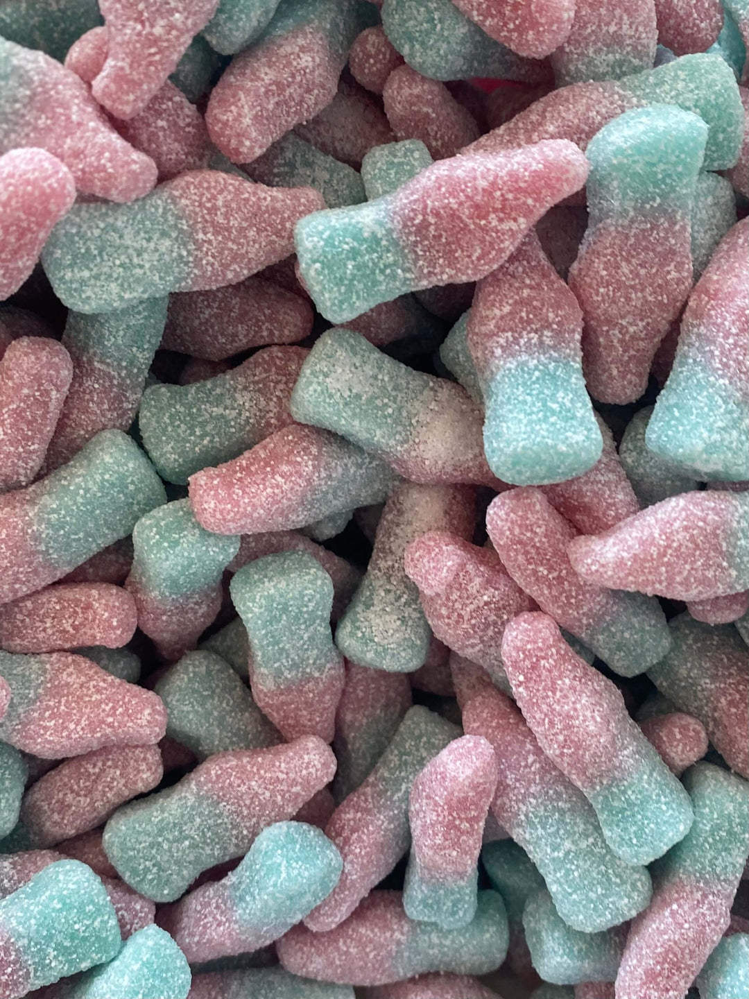 Colorful bubblegum soft and hard candy mix featuring sweet and sour flavors.